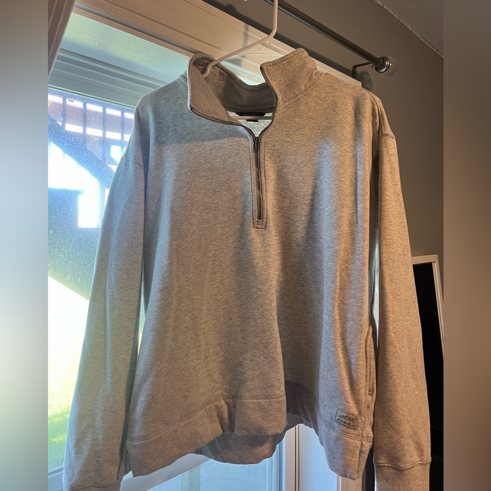 Half zip, heather gray sweatshirt! Super comfortable and warm. Worn once